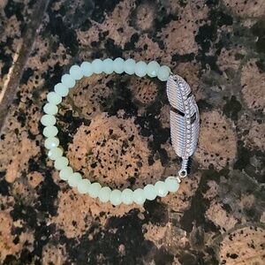 Charming Charlie feather bracelet